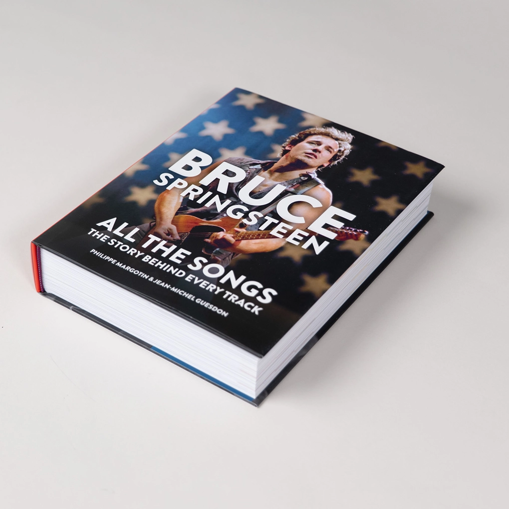 The book lies flat to show the dimensions